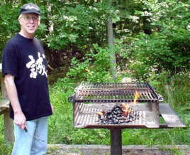 Drew prepares the grill